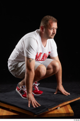 Whole Body Man White Sports Shirt Shorts Chubby Kneeling Studio photo references